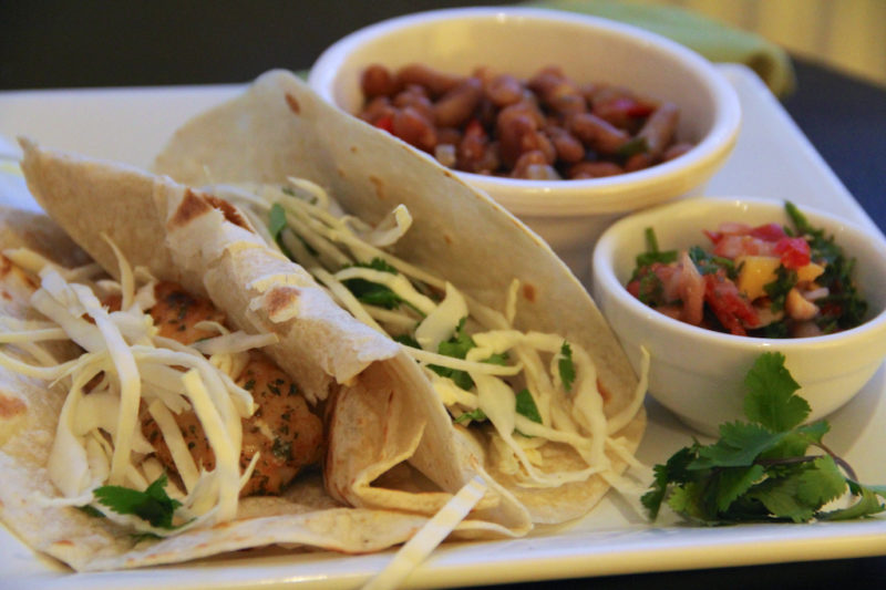 traditional fish tacos with beans and salsa